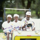 Serena Williams and her sister Venus Williams ride with their father Richard Williams at a tennis camp in Florida.